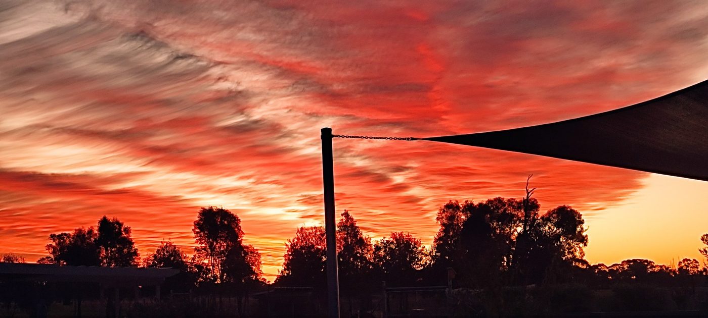 Red sunset over the farm